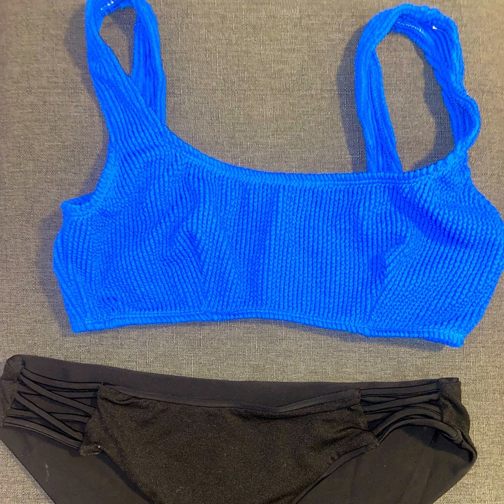 2 piece bathing suit. blue top/black bottoms